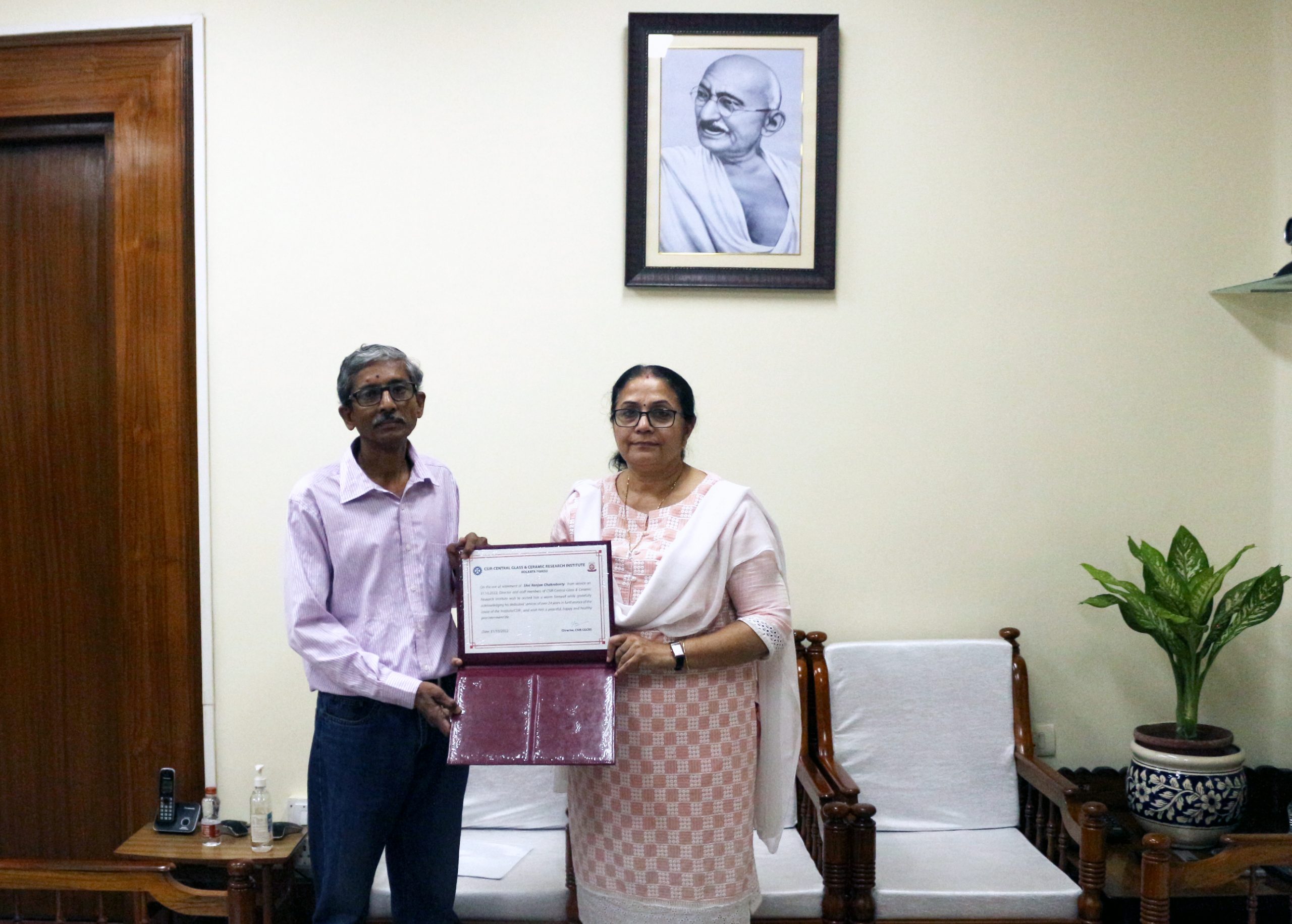 Director presenting Certificate to Shri Ranjan Chakraborty upon superannuation in October, 2022